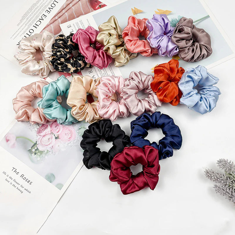 A variety of colored 100% silk scrunchies