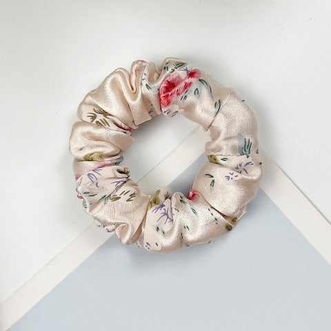 A collection of colorful 100% silk scrunchies-21