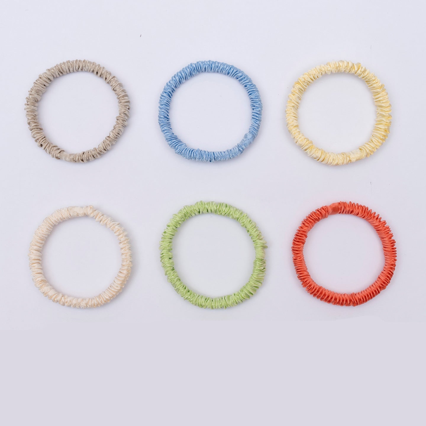 Beige, light blue, pale yellow, off - white, mint green, and red 100% silk scrunchies