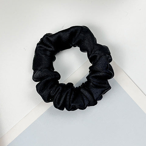 A collection of colorful 100% silk scrunchies-6