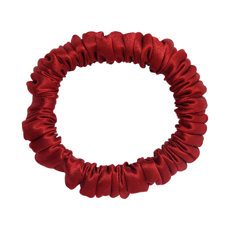 A set of silk scrunchies in black, gray, beige, brown, light blue, pink, and green colors-5