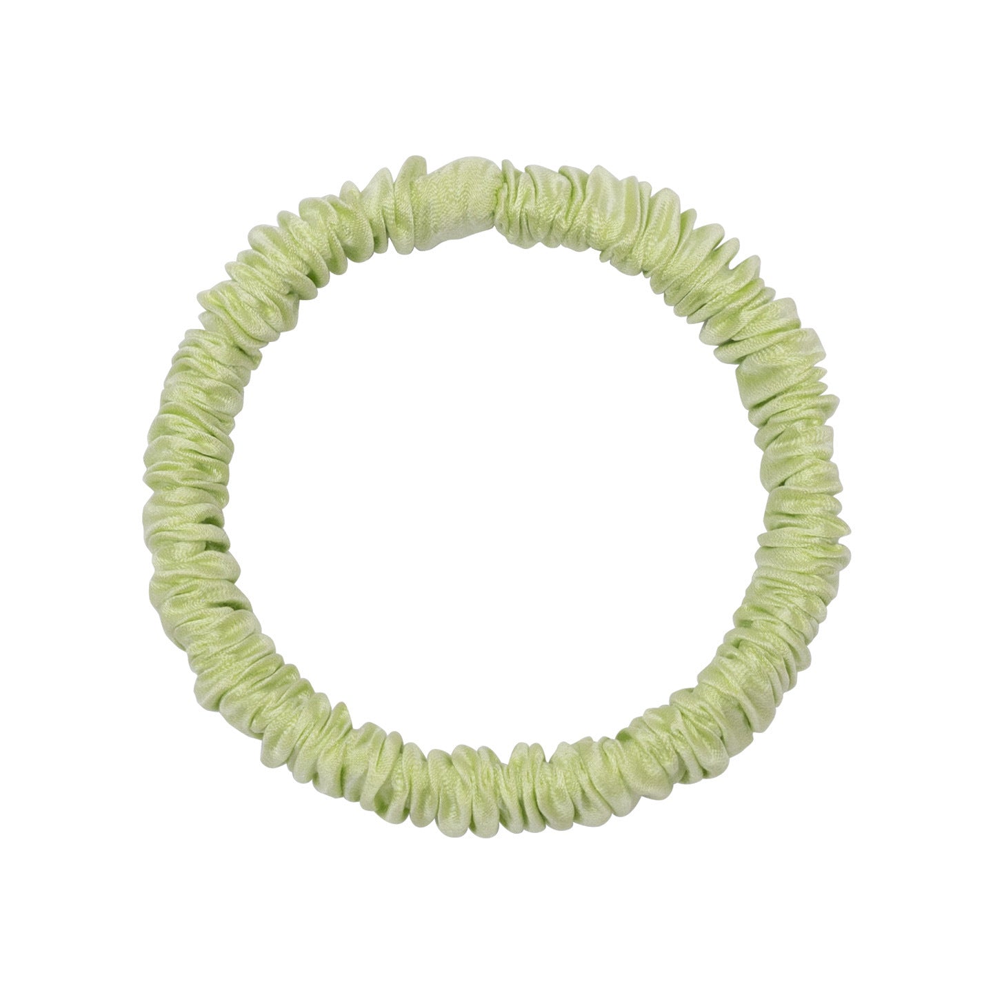 A woman wearing colorful 100% silk scrunchies in her hair and on her wrist-15