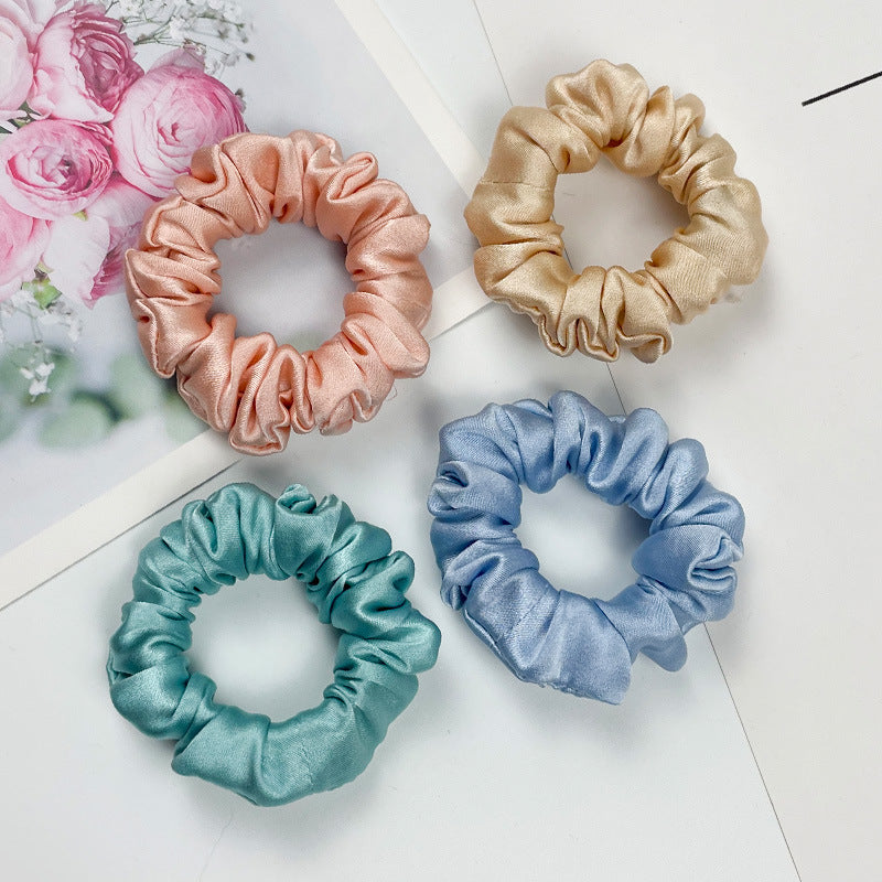 A collection of colorful 100% silk scrunchies-4