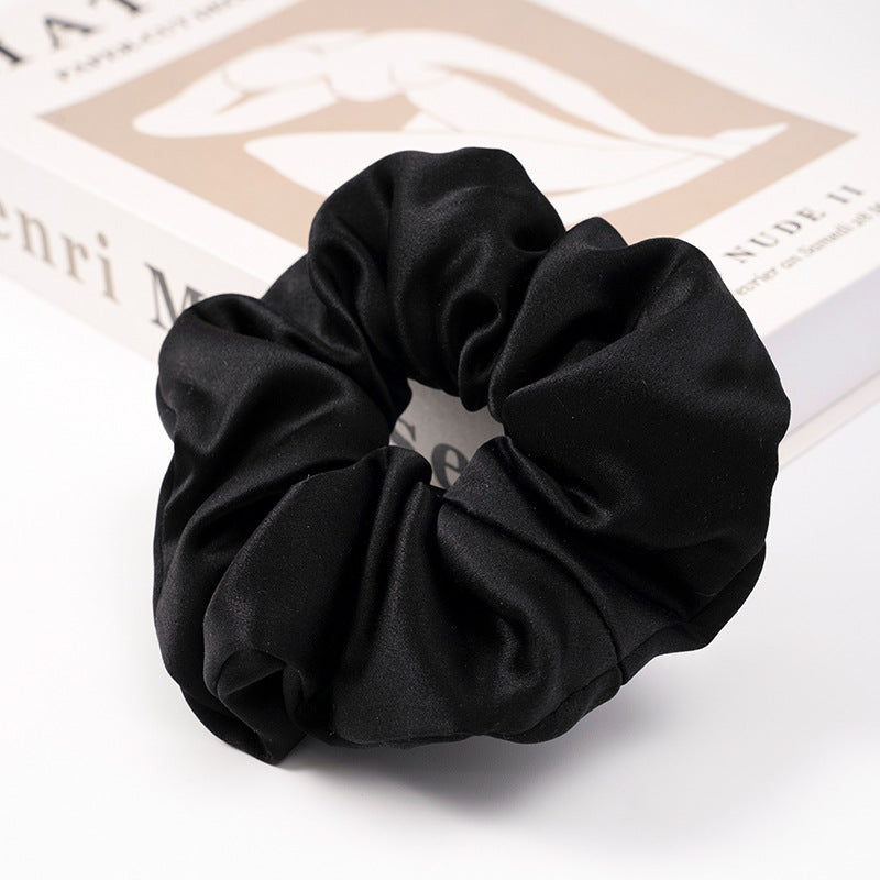 Solid - colored 100% silk scrunchies in beige, light blue, white, red, and black-6
