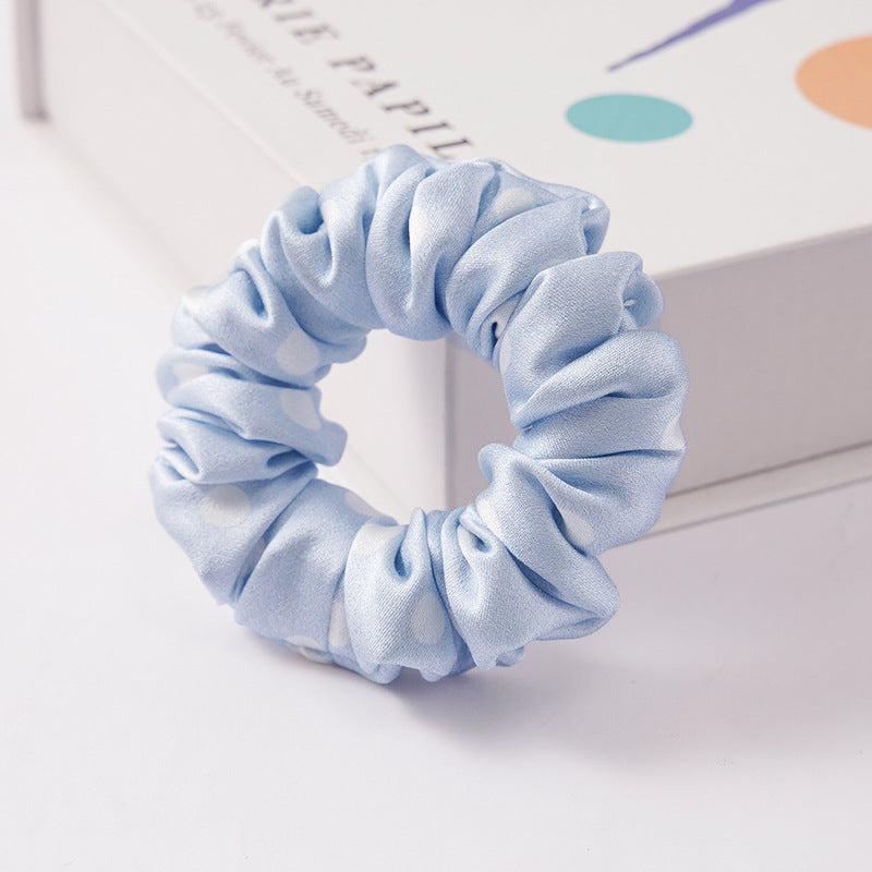 A set of silk scrunchies in black, brown, white, pink, green, and gray colors-23