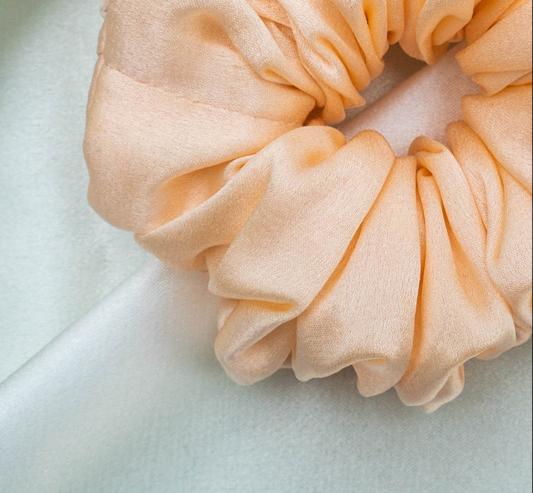 A collection of colorful 100% silk scrunchies-2