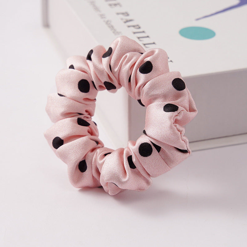 A set of silk scrunchies in black, brown, white, pink, green, and gray colors-21