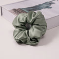 Solid color 100% silk scrunchies in light blue, pink, beige, and other colors-6