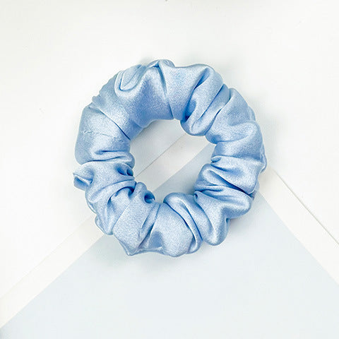 A collection of colorful 100% silk scrunchies-18