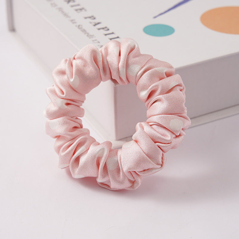 A set of silk scrunchies in black, brown, white, pink, green, and gray colors-25