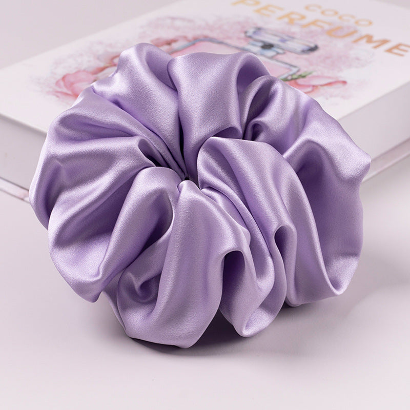 A set of silk scrunchies in various colors including beige, blue, brown, and more-57