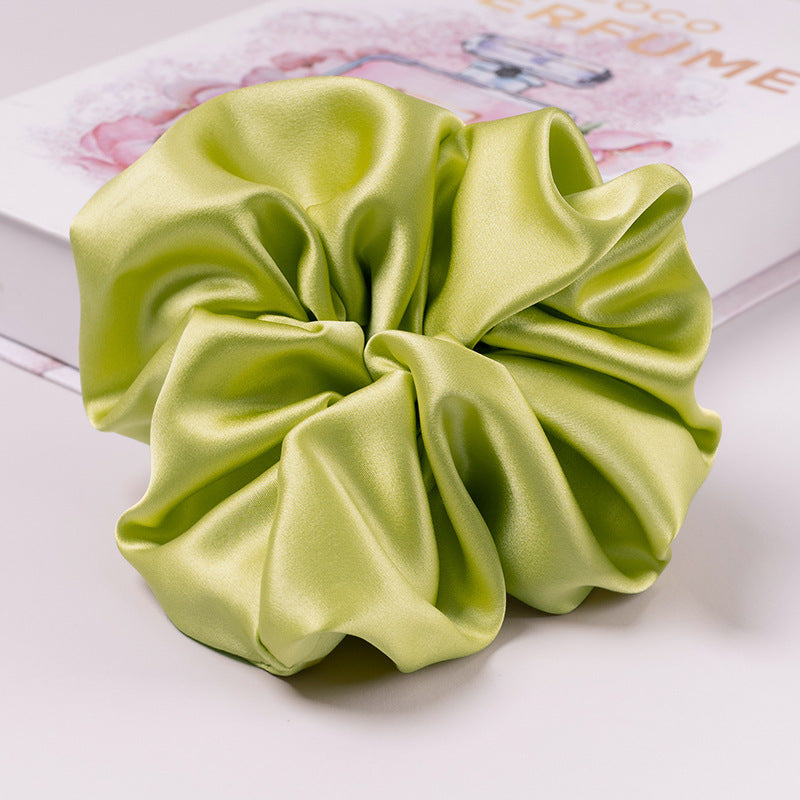 A set of silk scrunchies in various colors including beige, blue, brown, and more-55