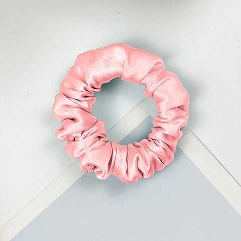 A collection of colorful 100% silk scrunchies-7