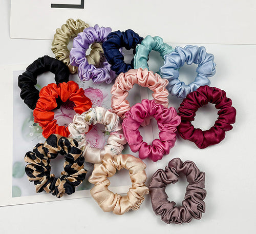A collection of colorful 100% silk scrunchies