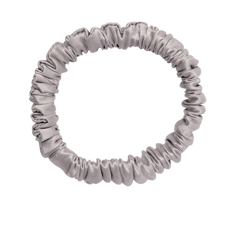 A set of silk scrunchies in black, gray, beige, brown, light blue, pink, and green colors-8