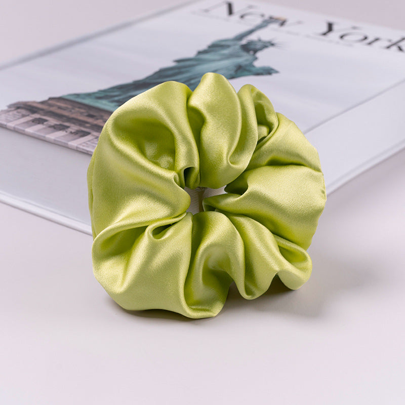 A set of silk scrunchies in various colors including beige, blue, brown, and more-42
