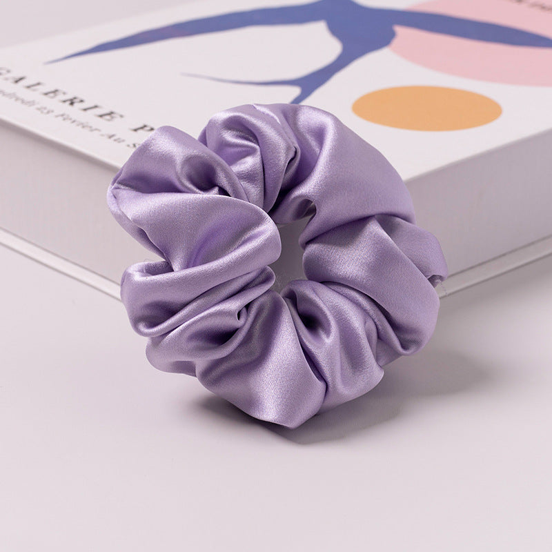 A set of silk scrunchies in various colors including beige, blue, brown, and more-31