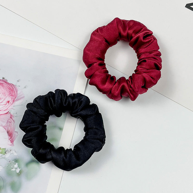 A collection of colorful 100% silk scrunchies-2