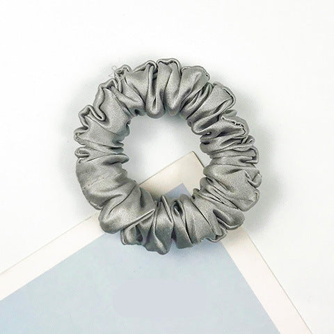 A collection of colorful 100% silk scrunchies-13