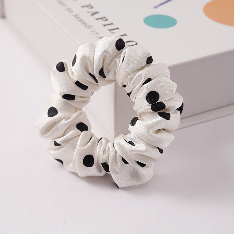 A set of silk scrunchies in black, brown, white, pink, green, and gray colors-22
