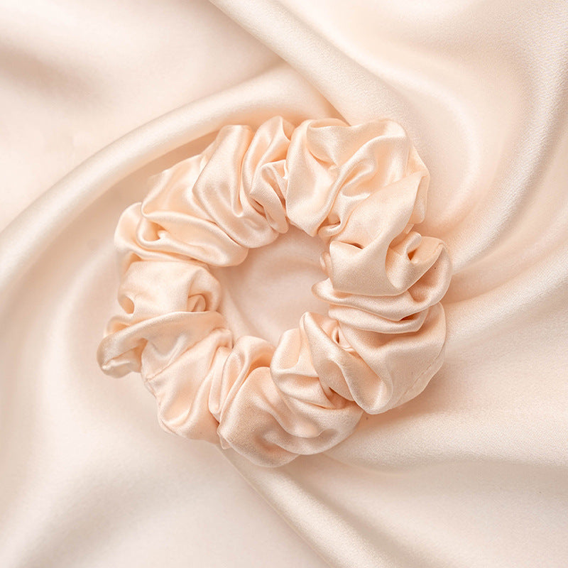 A collection of colorful 100% silk scrunchies-20
