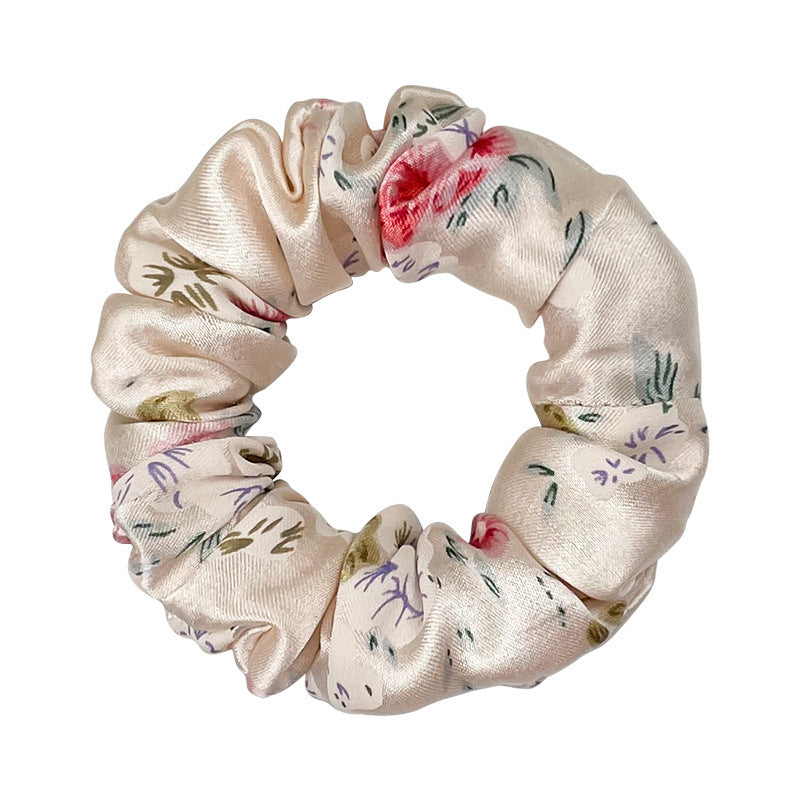 A collection of colorful 100% silk scrunchies-5