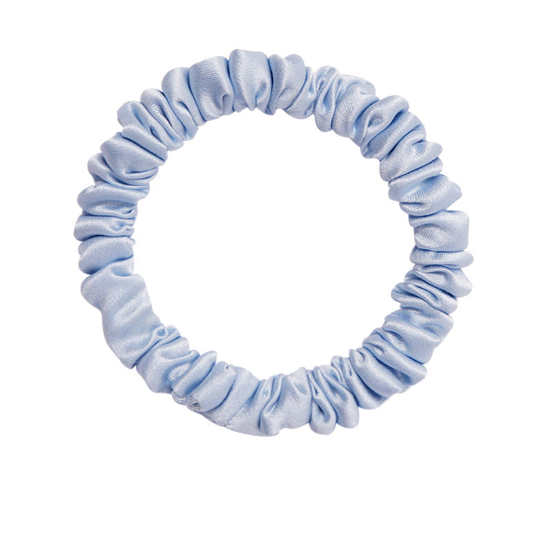 A set of silk scrunchies in black, gray, beige, brown, light blue, pink, and green colors-13