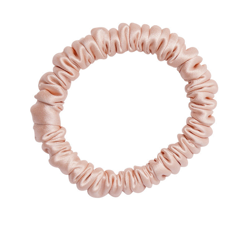 A set of silk scrunchies in black, gray, beige, brown, light blue, pink, and green colors-14