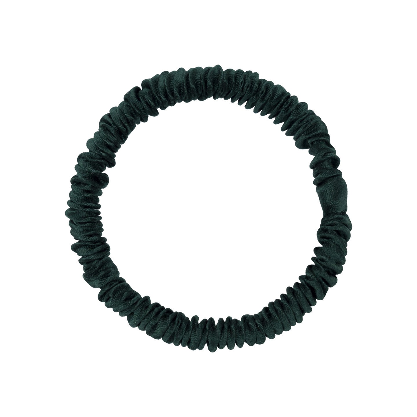 A woman wearing colorful 100% silk scrunchies in her hair and on her wrist-24