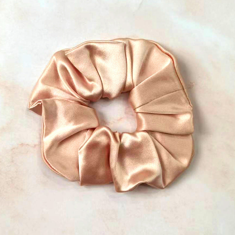 Soft - colored 100% silk scrunchies in peach, light - pink, and mint - green-6