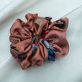 A collection of colorful 100% silk scrunchies-6