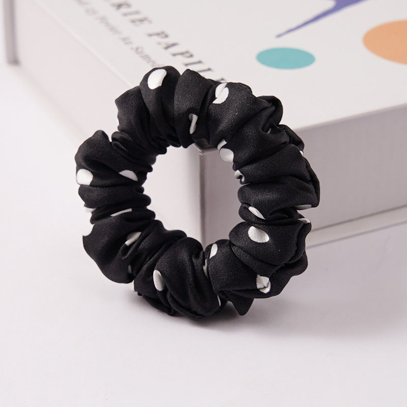 A set of silk scrunchies in black, brown, white, pink, green, and gray colors-20