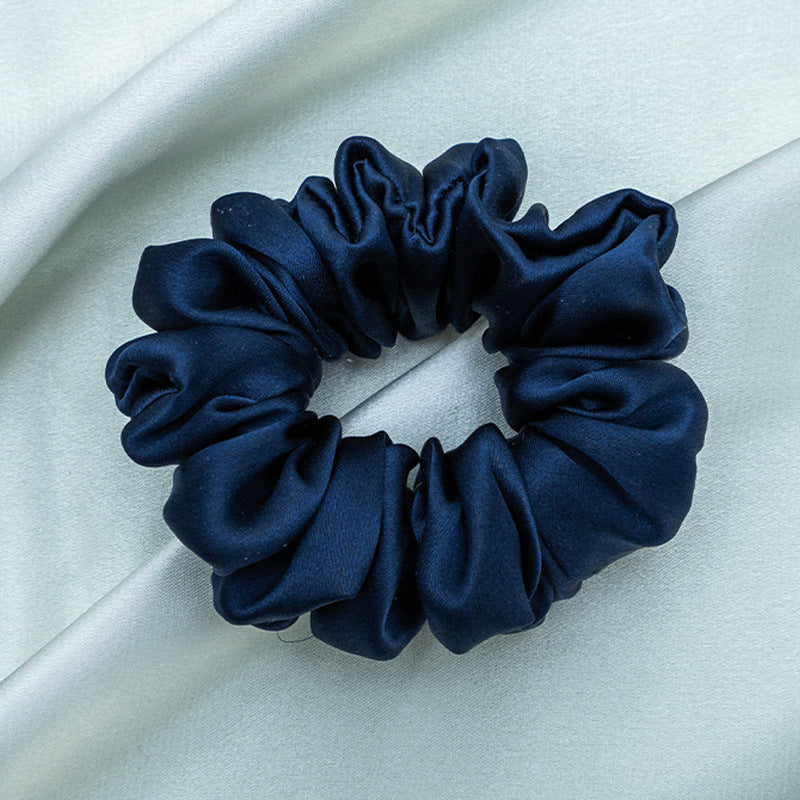 A collection of colorful 100% silk scrunchies-4
