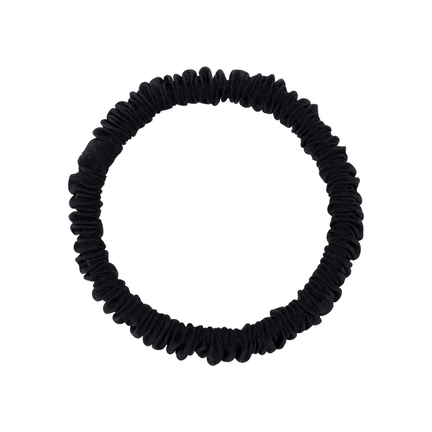 A woman wearing colorful 100% silk scrunchies in her hair and on her wrist-6