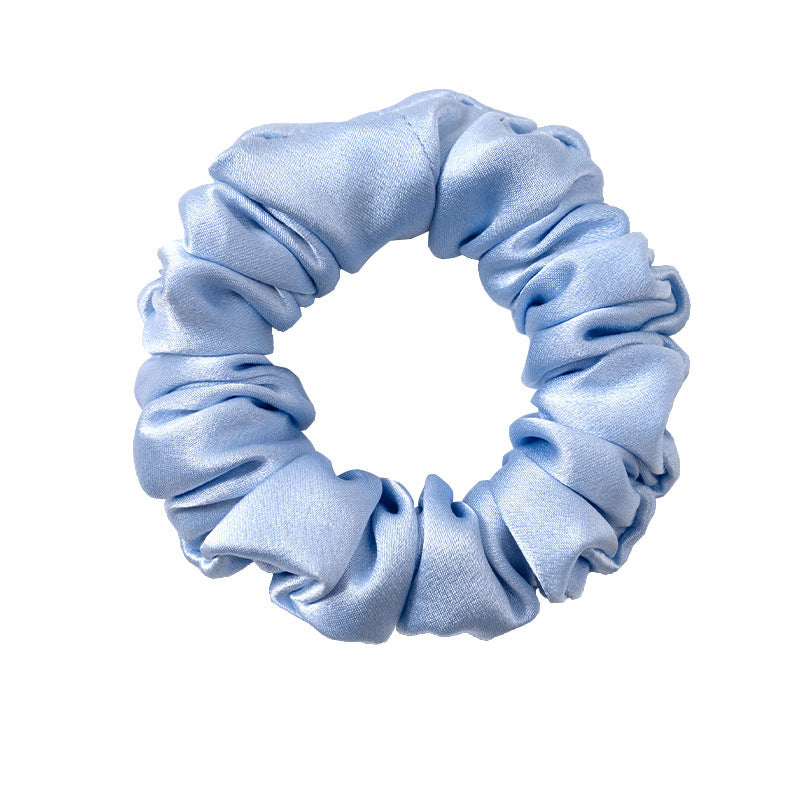 A set of silk scrunchies in black, brown, white, pink, green, and gray colors-5