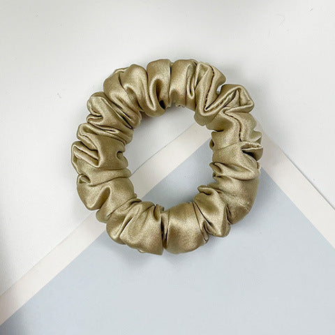 A collection of colorful 100% silk scrunchies-10