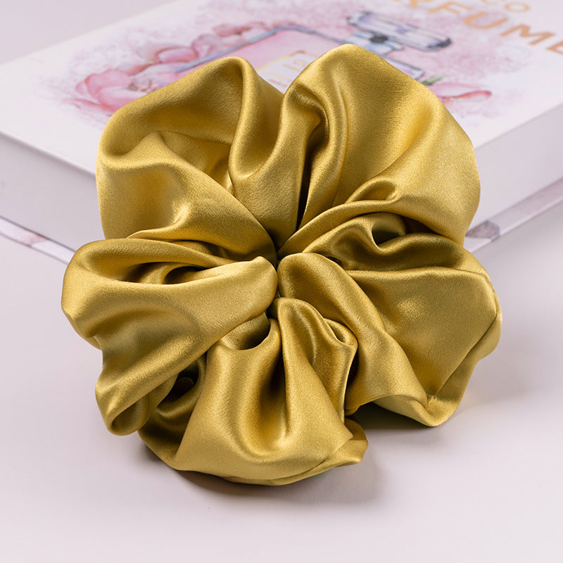 A set of silk scrunchies in various colors including beige, blue, brown, and more-56
