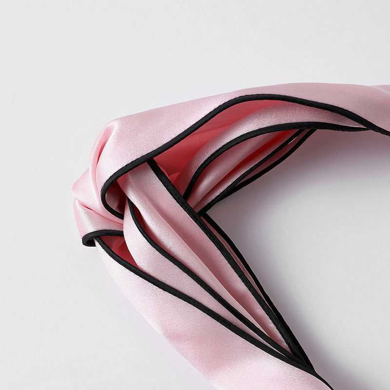 Orange geometric patterned 100% silk headband on a woman-3