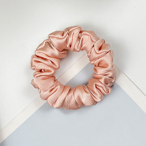 A collection of colorful 100% silk scrunchies-9