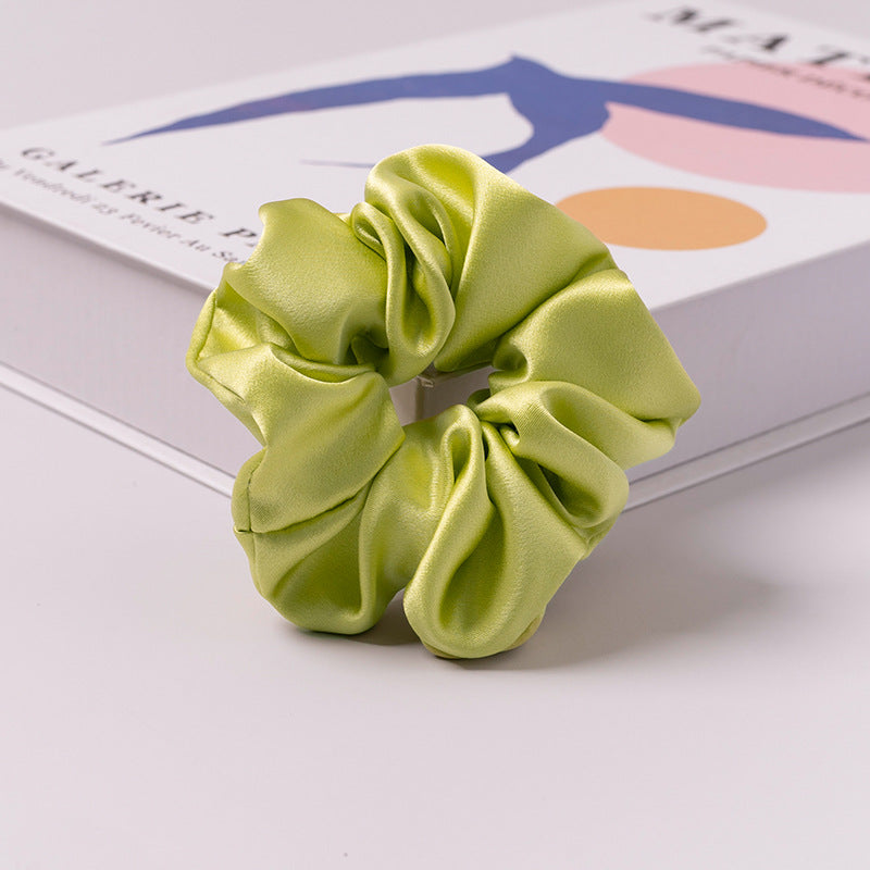 A set of silk scrunchies in various colors including beige, blue, brown, and more-29