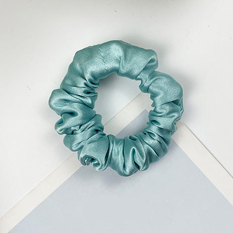 A collection of colorful 100% silk scrunchies-15