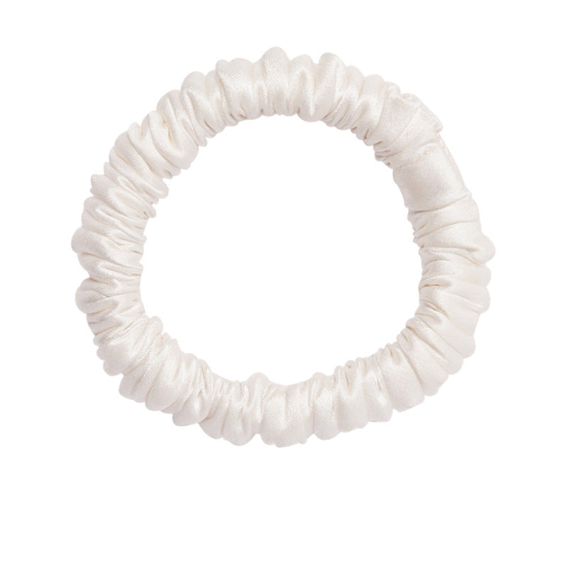A set of silk scrunchies in black, gray, beige, brown, light blue, pink, and green colors-9